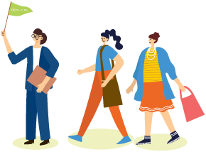 添乗員が旗を持ってお客様を誘導